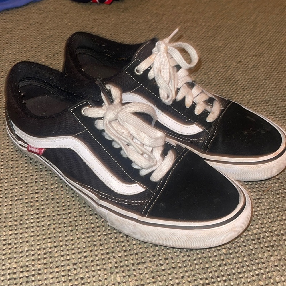 Black low top Vans